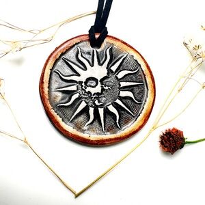 Surly-Ramics Sun Salutations Ceramic Pendant Necklace w/ Faux Suede Cord NIB